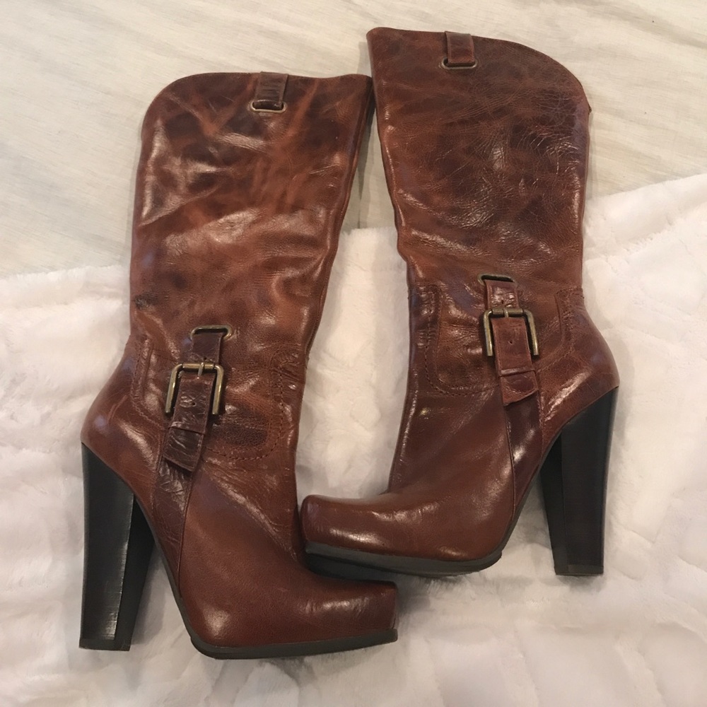 Brown leather high heeled boots